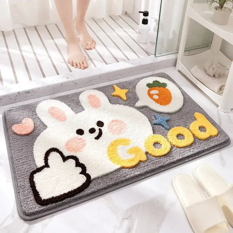 Gray plush bath rug featuring a white bunny with colorful decorbites cartoon animal embroidery for bathroom use