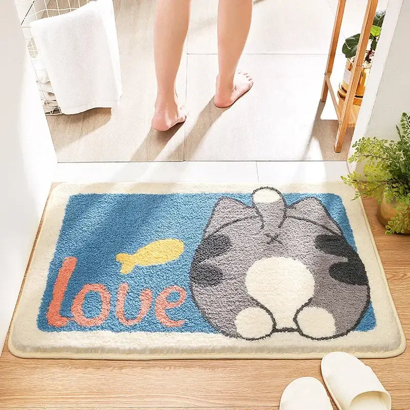 Plush blue and gray cat-themed bath rug with soft shaggy texture love lettering and yellow fish decorbites cartoon animal bathroom design