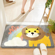 A plush gray bath rug featuring a cheerful yellow lion and pastel rainbow clouds for decorbites cartoon animal bathroom use