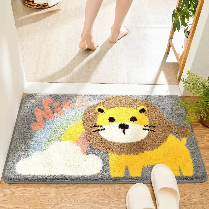 A plush gray bath rug featuring a cheerful yellow lion and pastel rainbow clouds for decorbites cartoon animal bathroom use