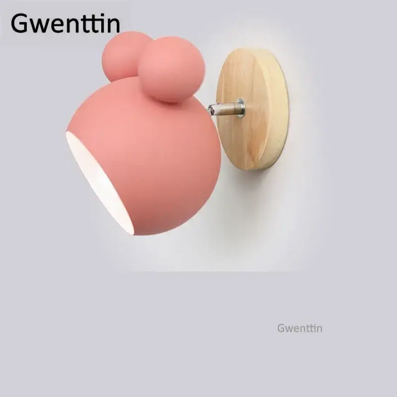 Pastel pink matte wall lamp with whimsical bear design and light wood backplate for kids bedroom decorbites cartoon mouse