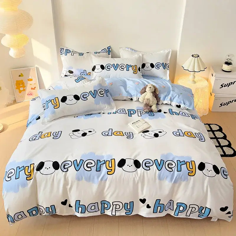 Playful white and light blue dog print bedding set with cartoon faces yellow blue lettering and heart motifs for bedroom decor