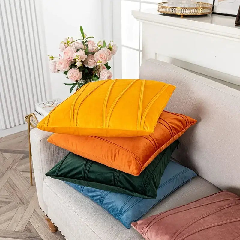 Stacked pleated short wool velvet throw pillows in vibrant yellow orange green blue and pink for living room decorbites knit short
