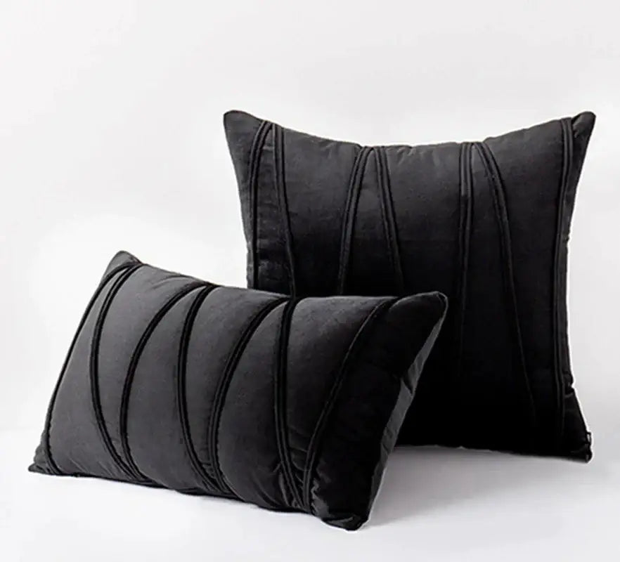 Black velvet throw pillows with vertical pleated detailing complement decorbites knit short wool velvet living room decor