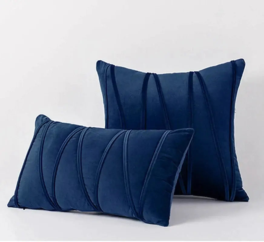 Deep navy velvet throw pillows with elegant vertical pleats complement pleated mustard yellow short wool velvet decorbites knit short pillowcases