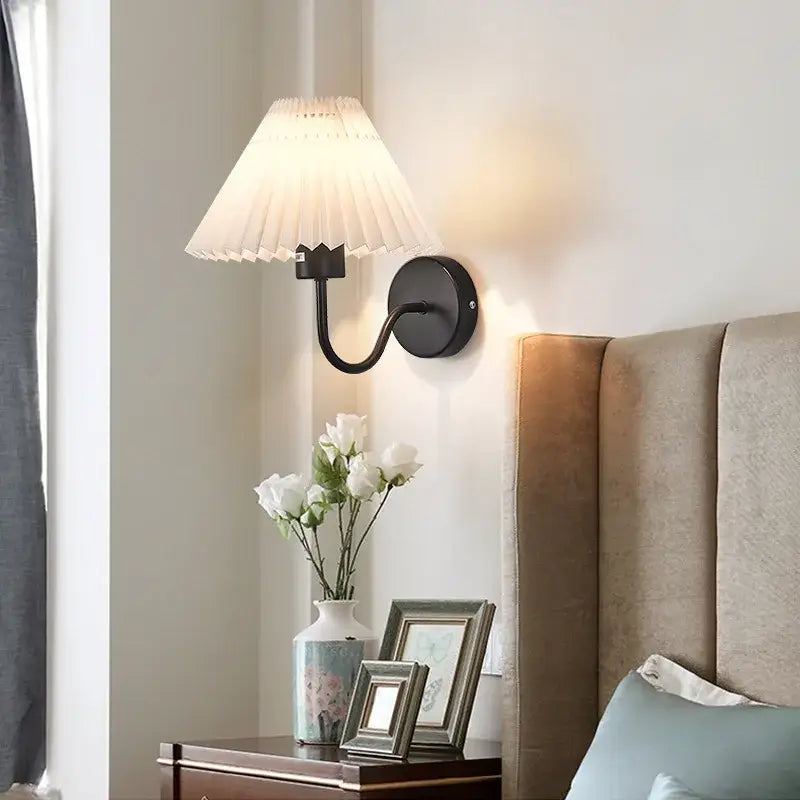 Black wrought iron wall lamp with pleated off-white decorbites cloth lampshade led for bedroom living room decor