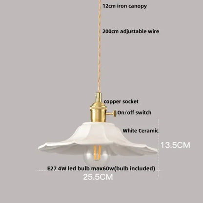 Pleated white ceramic wood pendant light with fluted petal design and brass-colored copper socket for decorbites ceramic wood decor