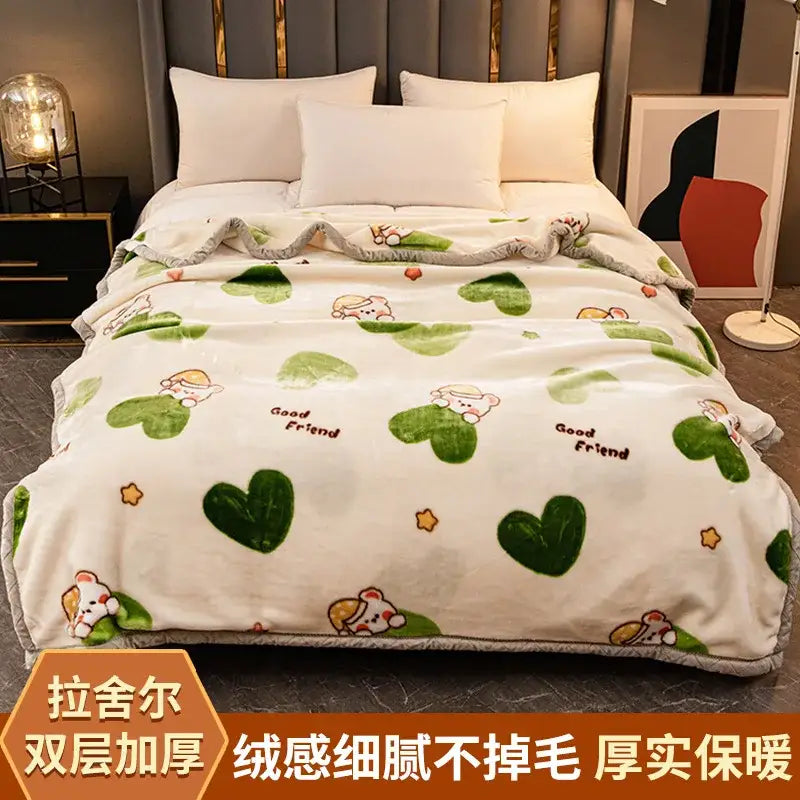 Cream-colored plush raschel blanket with green heart and bear patterns and good friend text for decorbites winter use
