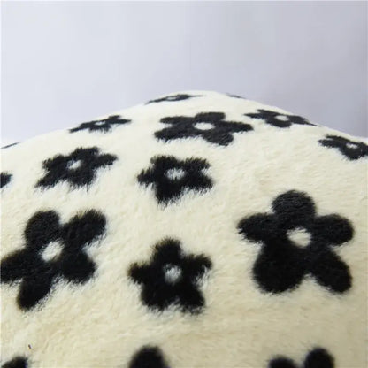 Cream-colored plush cushion cover with black white flower pattern for living room decor by decorbites black white