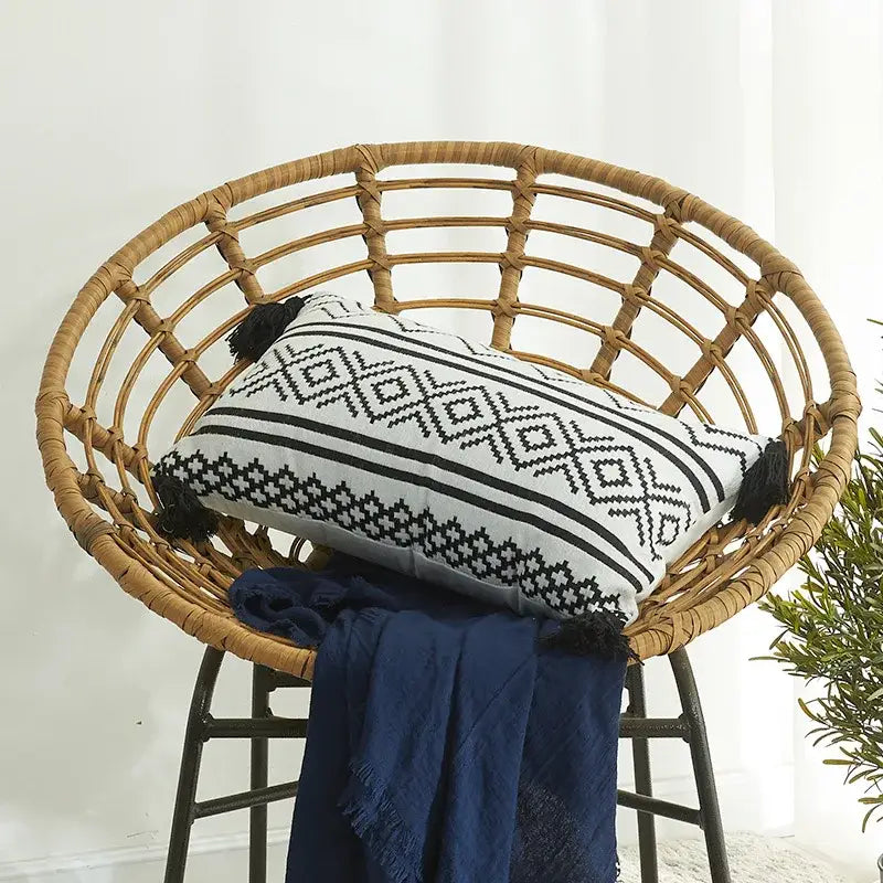Plush black and white houndstooth cushion cover with geometric pattern and tassel accents for stylish decorbites houndstooth cushion decor
