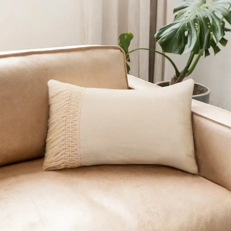Cream-colored rectangular pillow with woven fringe detail complementing decorbites houndstooth cushion cover