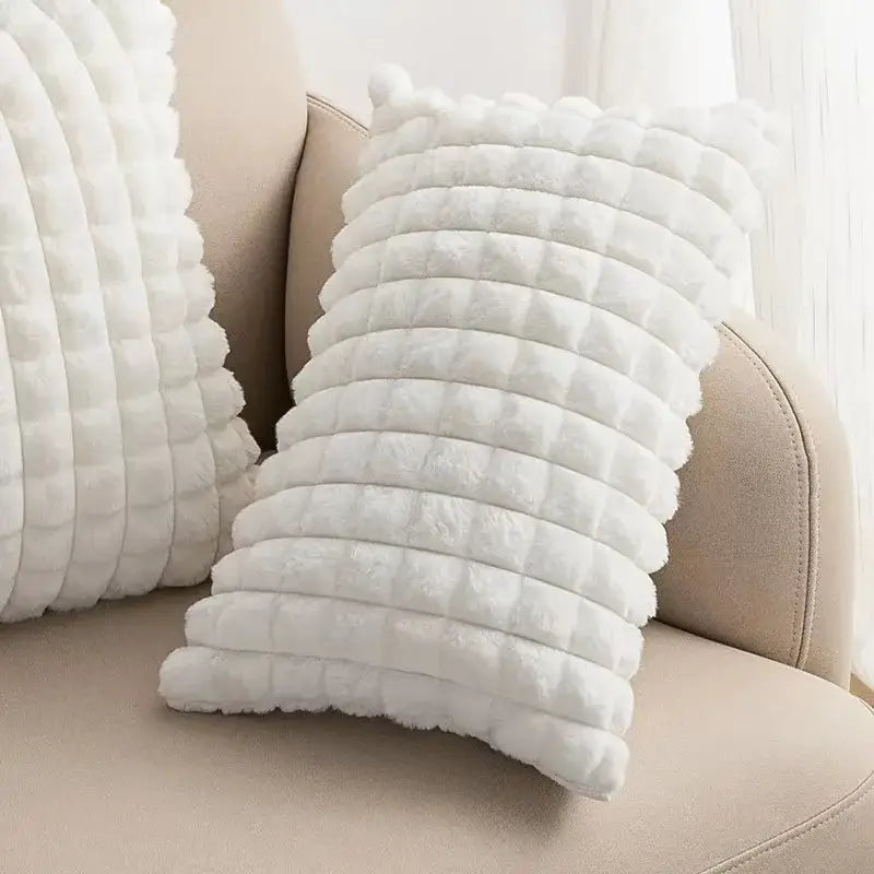 White plush pillow with quilted textured surface featured in decorbites houndstooth cushion cover bedroom set