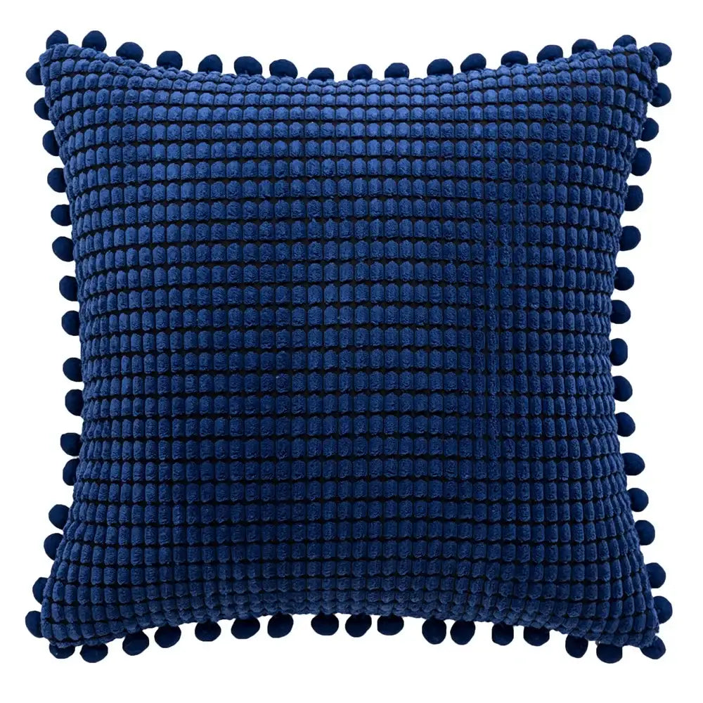 Deep blue textured cushion cover with plush woven pattern and decorative pom-poms for decorbites houndstooth cushion