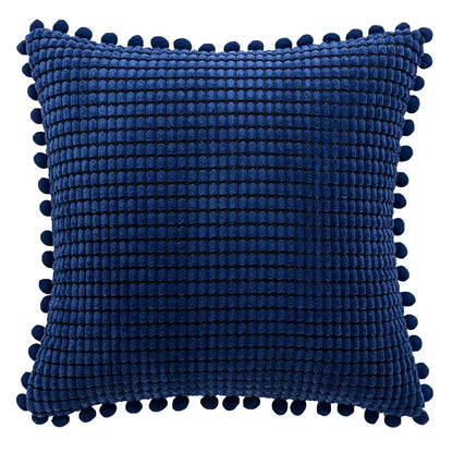 Deep blue textured cushion cover with plush woven pattern and decorative pom-poms for decorbites houndstooth cushion