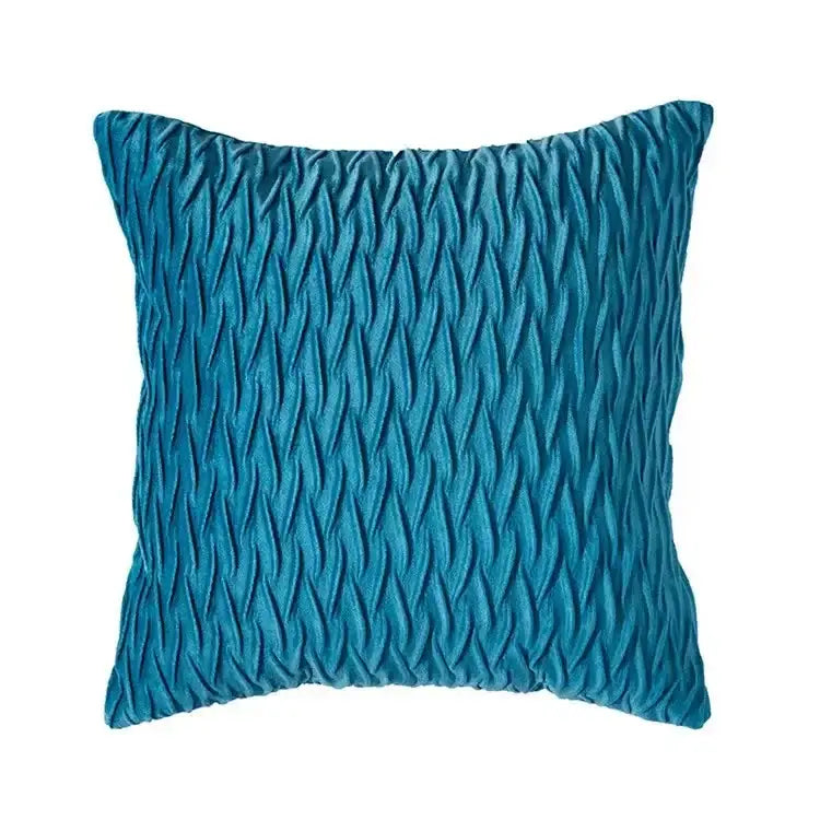 Teal square cushion cover with textured wavy pleated fabric contrasting with plush black and white houndstooth cushion cover decorbites bow pillow