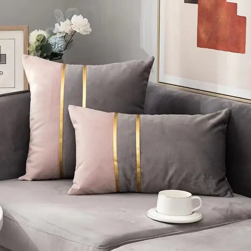 Two rectangular velvet throw pillows in soft pink and muted gray with gold stripes for decorbites houndstooth cushion cover