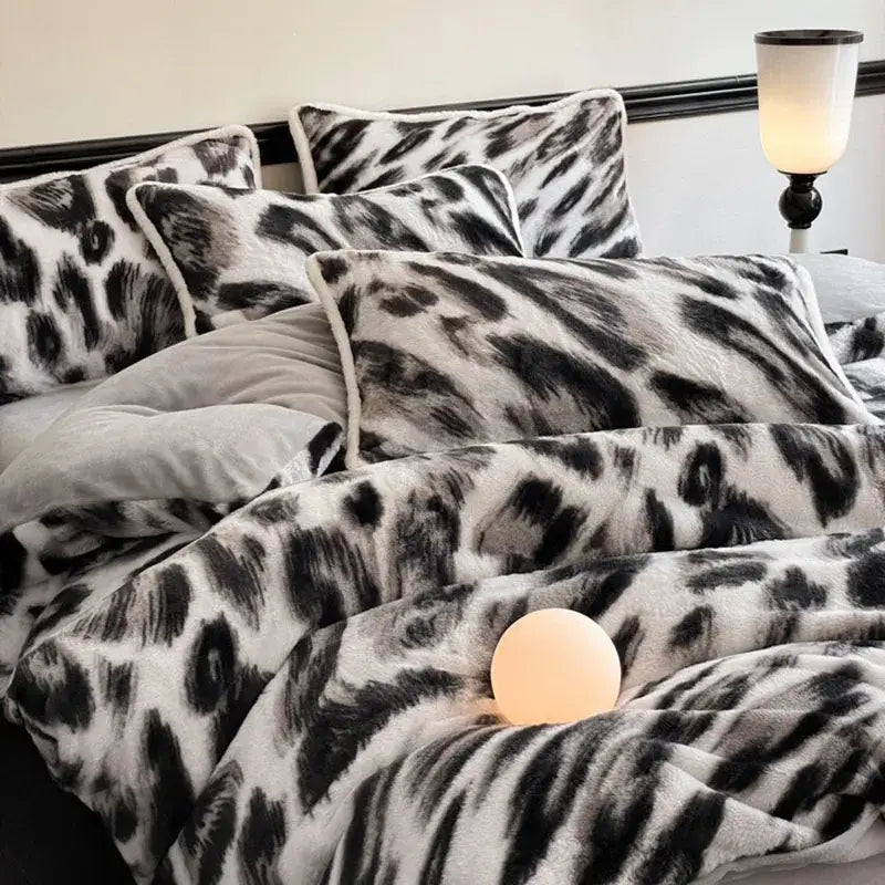 Plush black and white leopard print bed set with soft cozy rabbit hair fabric from decorbites cozy rabbit collection