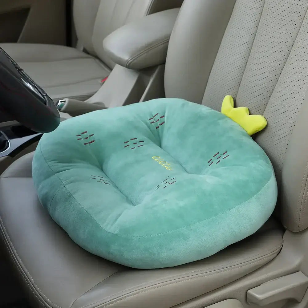A soft mint-green plush cartoon car cushion with embroidered cactus design and yellow crown, ideal for office chair or car sofa
