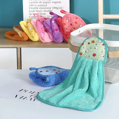 Turquoise microfiber hand towel paired with a fruit-patterned fabric headband featuring decorbites coral velvet hand design