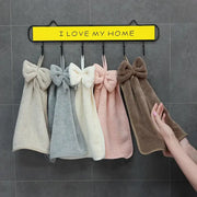 A set of five decorbites coral velvet soft hand towels in cream gray white pink and brown with fluffy bows for kitchen and bathroom