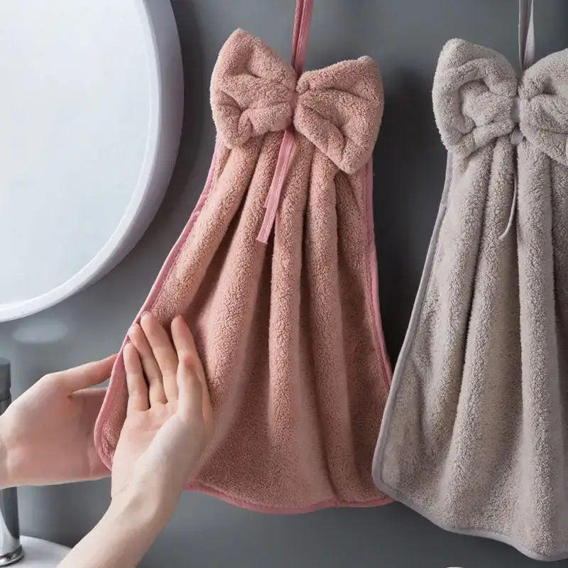 Pink plush coral velvet soft hand towel with bow hanging on hook for kitchen and bathroom decorbites hand towels