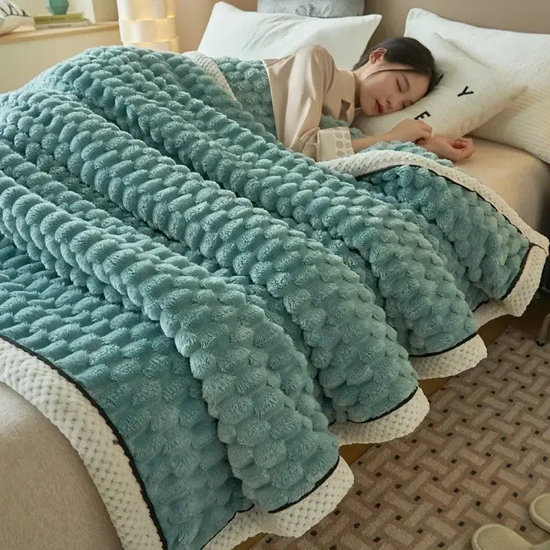Plush cream and black flannel fleece blanket with cozy flannel texture and mint-green pom-pom pattern decorbites cozy flannel