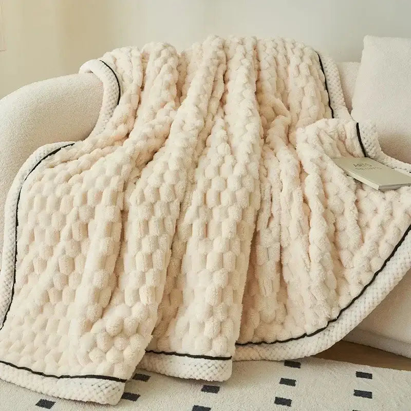 Plush cream and black chunky knit throw blanket with cozy flannel fleece trim ideal for decorbites cozy flannel decor