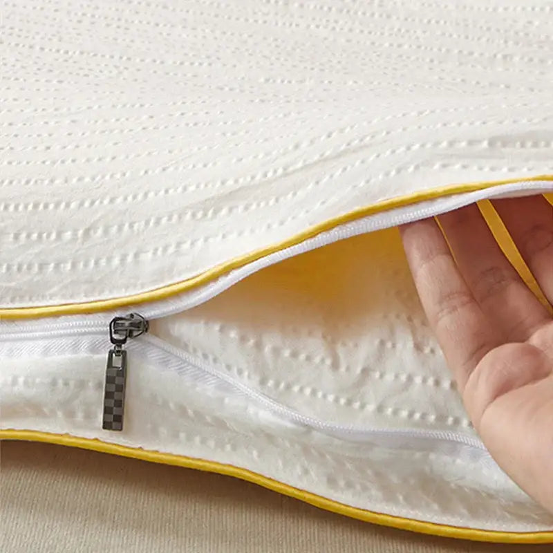 White quilted pillowcase with yellow trim and zipper closure for plush cream cozy soy fiber quilt bedding decorbites cozy soy
