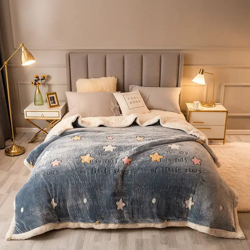 Plush cream floral fleece wool blanket with blue star-patterned soft fleece wool and cream fleece trim for bedroom use