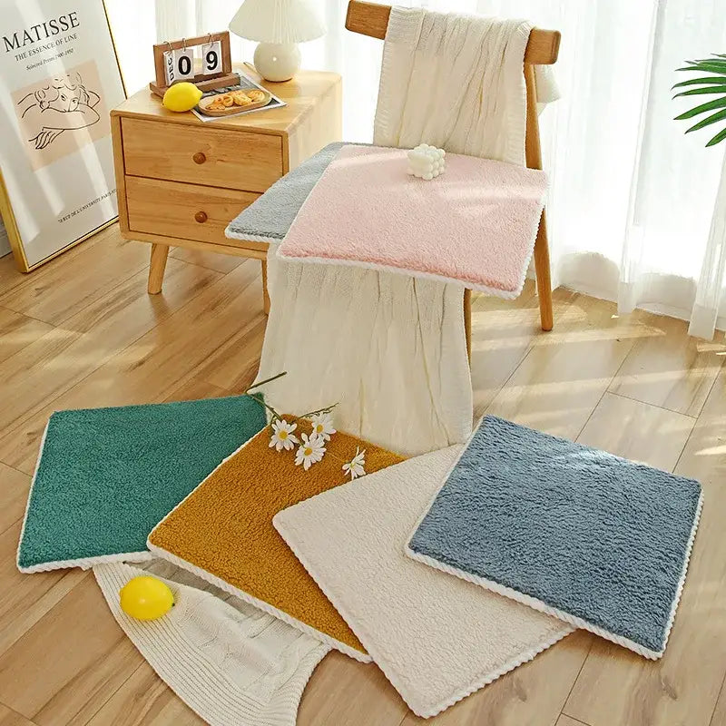 Soft plush wool chair cushions in pastel pink teal mustard yellow and blue with white scalloped edge for decorbites cozy use