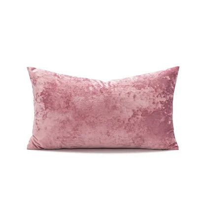 A plush dusty rose velvet pillow cover with a subtle mottled texture for living room decor dark grain style