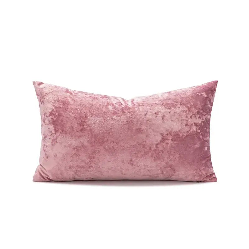 A plush dusty rose velvet pillow cover with a subtle mottled texture for living room decor dark grain style