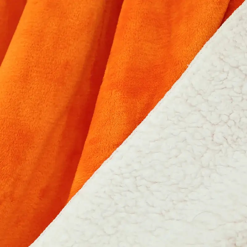 Orange and white sherpa fleece warm blanket showing the plush texture of a decorbites double-layer warm blanket