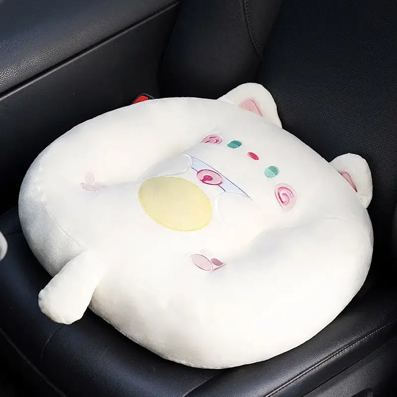 White plush cat shark cushion with embroidered pink and green facial features and yellow nose for kids room seat pad