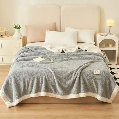 Soft gray plush coral fleece blanket with cream fleece border by decorbites for cozy bedroom or sofa cover