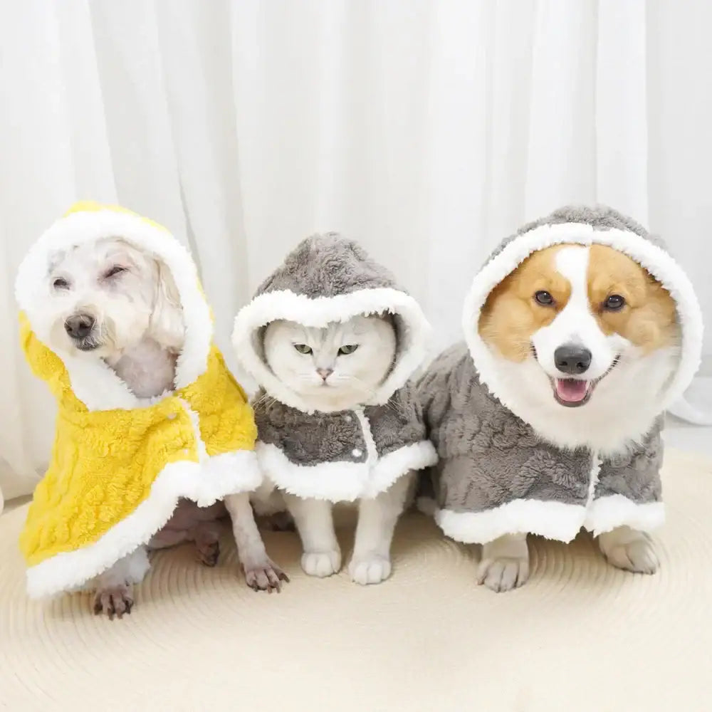 Three fluffy hooded pet coats in yellow and gray plush decorbites cozy velvet pet blanket for warmth and comfort