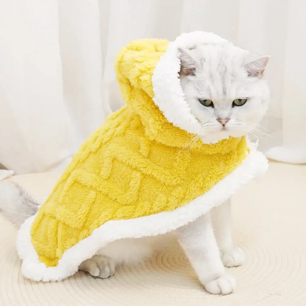 Yellow fuzzy hooded dog coat with white fleece trim and cable knit pattern for cozy velvet pet comfort by decorbites