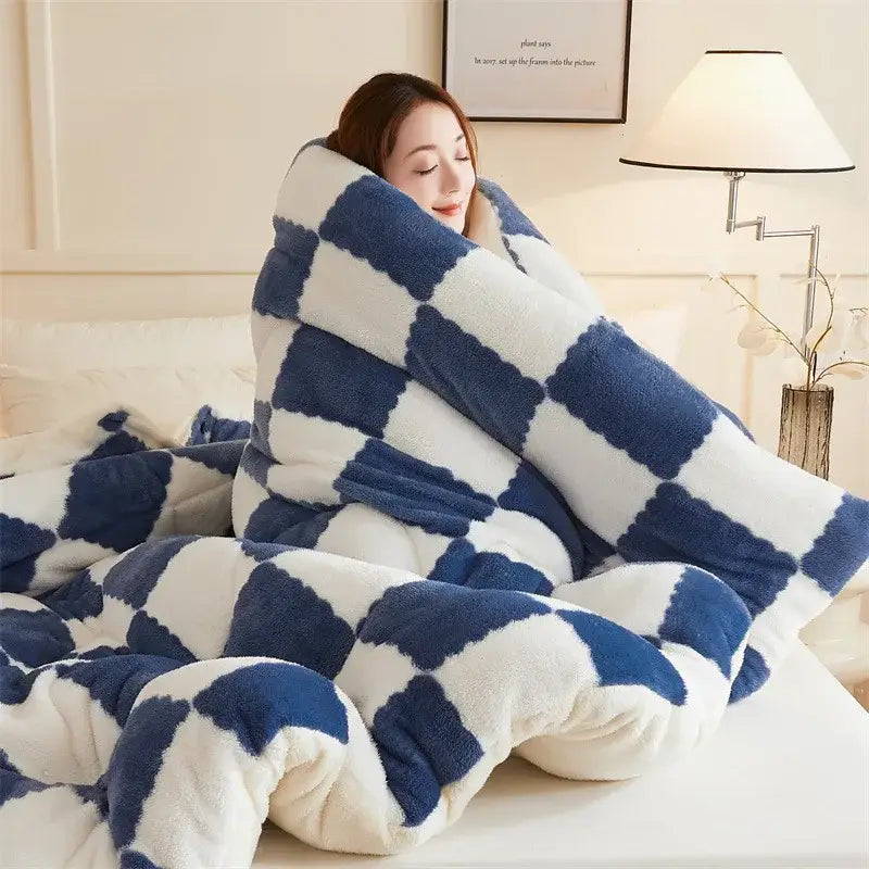 A plush navy and white cozy checkerboard duvet blanket made of soft fleece perfect for bedroom decorbites cozy checkerboard