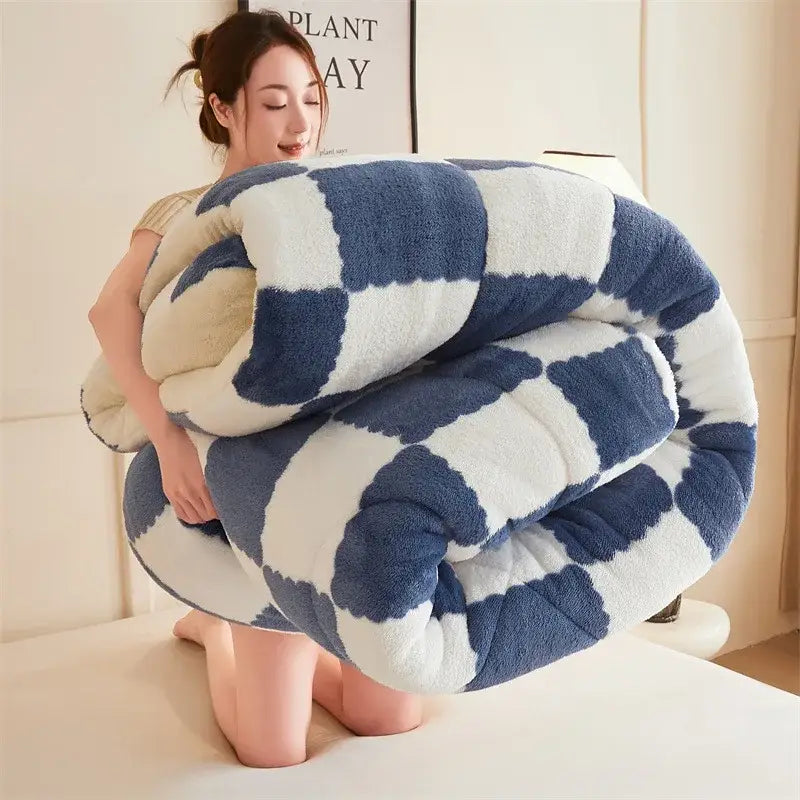 Plush navy and white cozy checkerboard duvet blanket made of soft fleece with a textured surface for bedroom use