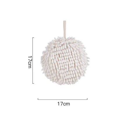 White round microfiber cleaning ball with hanging loop paired with plush orange and beige decorbites cat kitchen hand towel