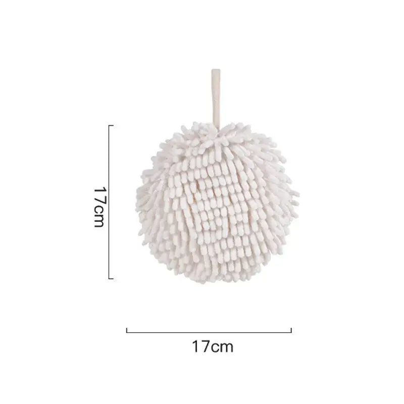 White round microfiber cleaning ball with hanging loop paired with plush orange and beige decorbites cat kitchen hand towel