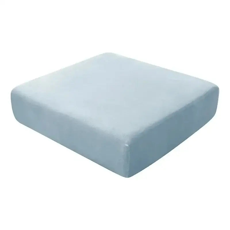 Light blue plush rectangular cushion made of velvet as an elastic sofa cover for living room protection