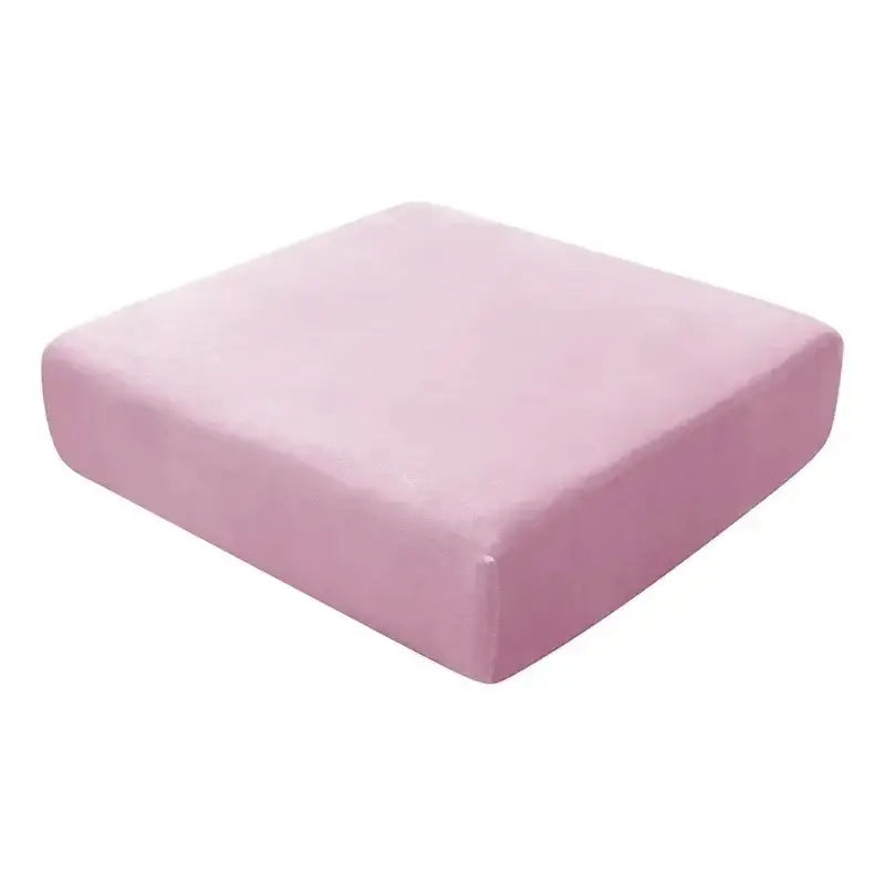 Soft pink rectangular velvet cushion with plush texture for elastic sofa cover living room protector
