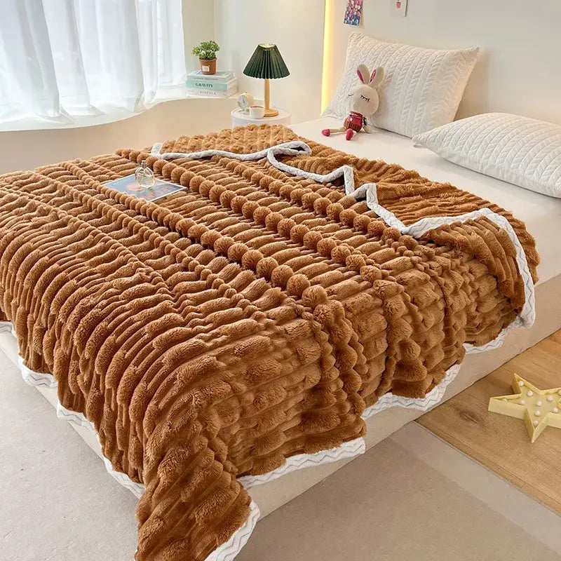 Warm brown bamboo velvet blanket with plush texture wavy pattern and white zigzag trim for bedroom throw use