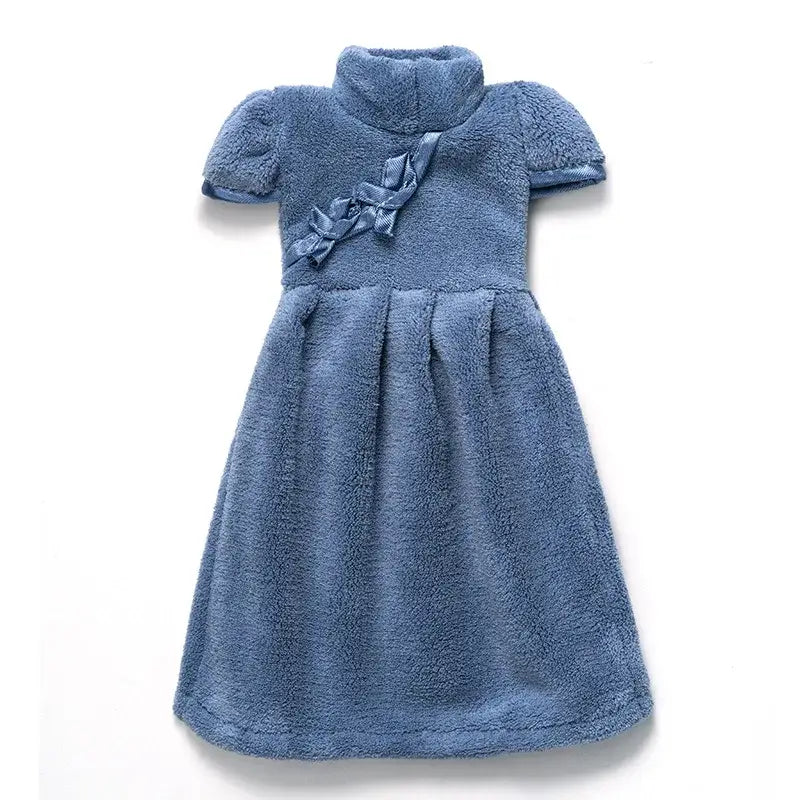 A soft blue plush hand towel in coral fleece cheongsam style with a high collar and decorative ribbon bow by decorbites