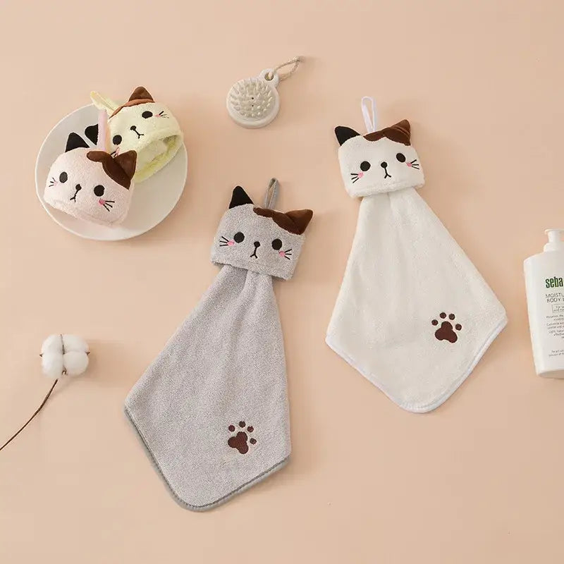 Plush pink and pale yellow cartoon cat hand towel with soft plush ears and embroidered paw prints by decorbites cartoon cat