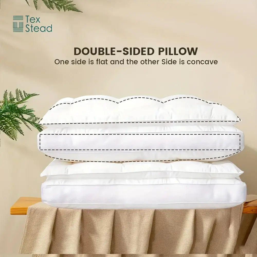 Plush white double layer fiber pillow with one flat and one concave side and quilted neck support design