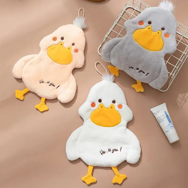 Plush white and gray duck terry towel kitchen cleaning cloth with soft plush duck shapes in pastel pink, gray, and white