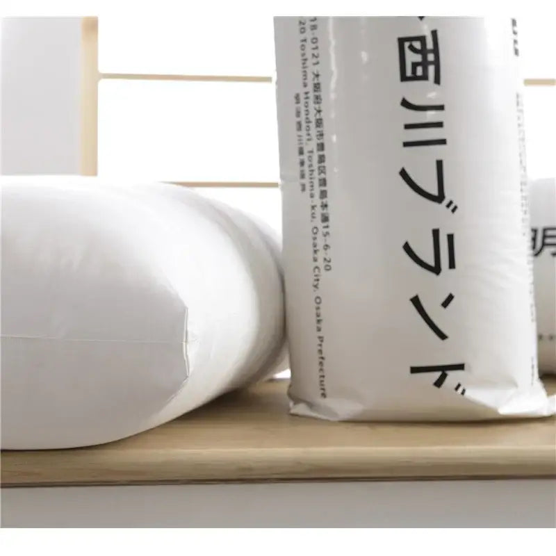Plush white quilted cotton rectangle neck pillow with minimalist black japanese text for decorbites cotton rectangle use