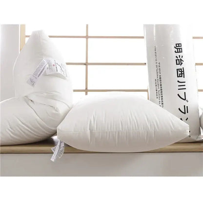 Plush white quilted cotton rectangle neck pillow with soft stitching details for decorbites bedroom decor